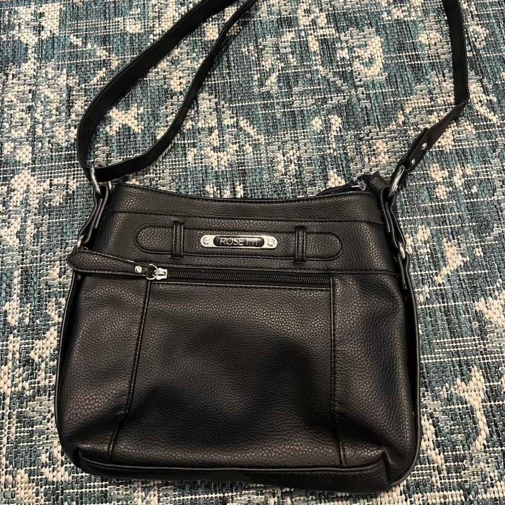 Black leather crossbody bag with silver hardware